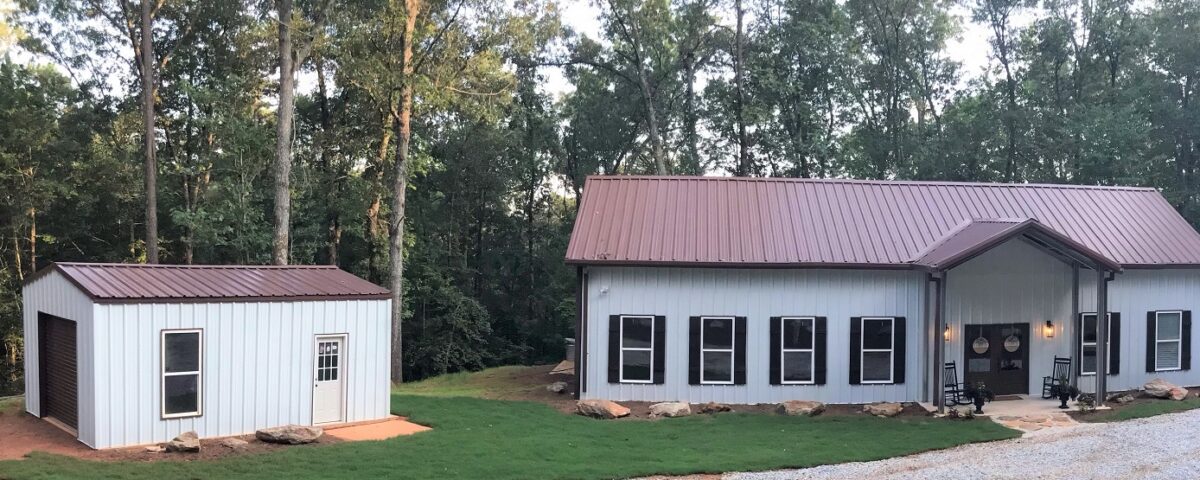 Modern galvanized steel barndominiums in Bacliff, Texas, showcasing rustic charm and durable design