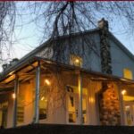 Beautiful galvanized steel barndominiums in Sienna Plantation, Texas showcasing modern living in a rural setting