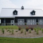 Beautiful view of galvanized steel barndominiums in Wells Branch, Texas, showcasing modern design and rustic charm