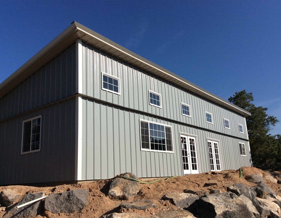 Modern galvanized steel barndominiums in Westminster, Colorado, showcasing innovative design and countryside living