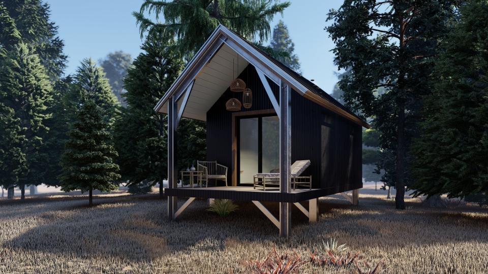 Modern galvanized steel cabins in Carbondale, Colorado, showcasing durability and rustic charm against a stunning mountain backdrop