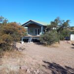 Stylish galvanized steel cabins in Edcouch, Texas, showcasing durability and modern design in a beautiful setting