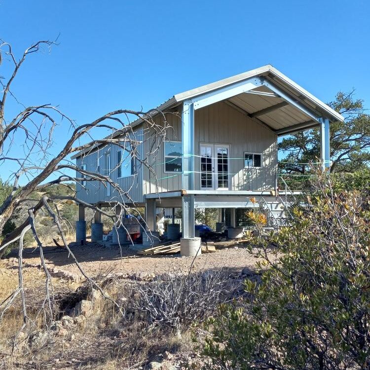 Galvanized steel cabins in Erie, Colorado, showcasing durability and modern design in a tranquil setting