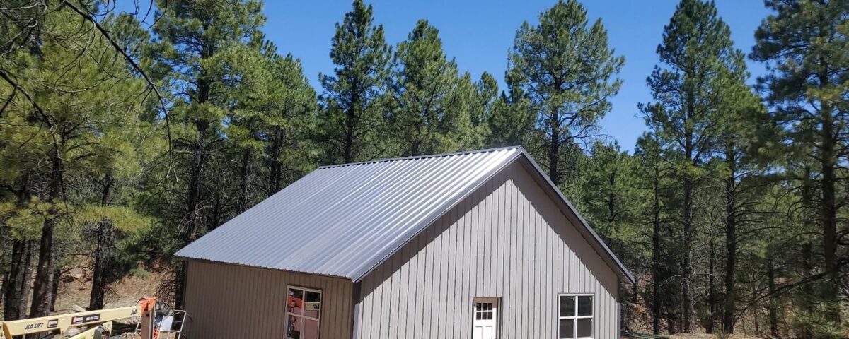 Modern galvanized steel cabins in Falcon, Colorado, showcasing durability and contemporary design amidst scenic landscapes