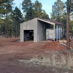 Galvanized steel cabins in Fort Hood, Texas, showcasing durable construction amid scenic landscapes