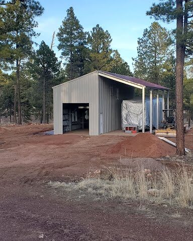 Galvanized steel cabins in Fort Hood, Texas, showcasing durable construction amid scenic landscapes