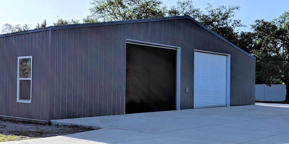 Exterior view of galvanized steel shops in Mineola, Texas, showcasing modern design and durable construction