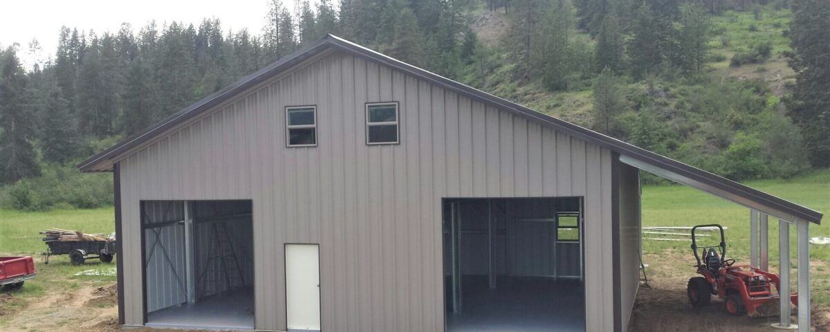 Exterior view of galvanized steel shops in Oak Ridge North, Texas, showcasing modern design and sturdy construction