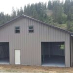 Exterior view of galvanized steel shops in Oak Ridge North, Texas, showcasing modern design and sturdy construction