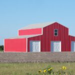 Exterior view of galvanized steel shops in Post, Texas, showcasing modern architecture and robust design