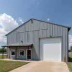 Image of galvanized steel shops in Cameron Park, Texas, showcasing modern architecture and industrial design